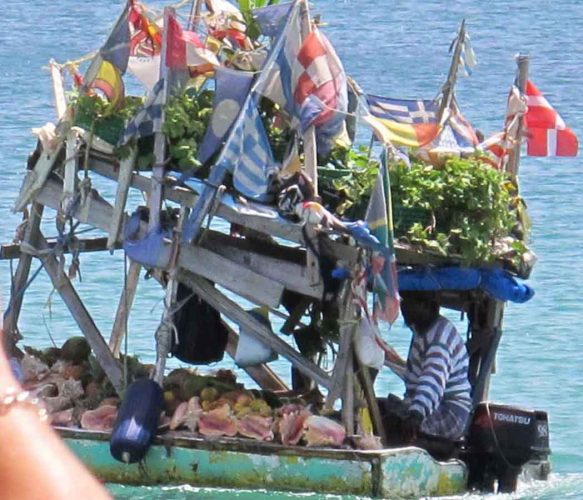 St Lucia Boat hawker selling shells